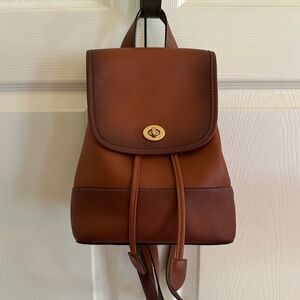 Limited edition COACH 1997 Reimagined Turnlock Mini Brown Leather Backpack Bag